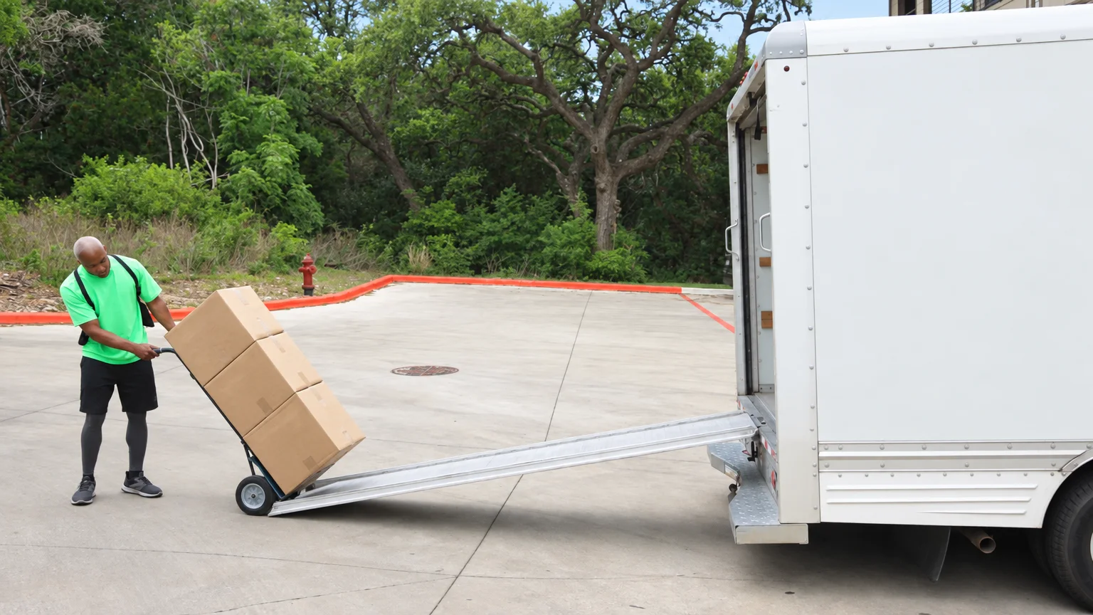 Movers loading household items into a truck