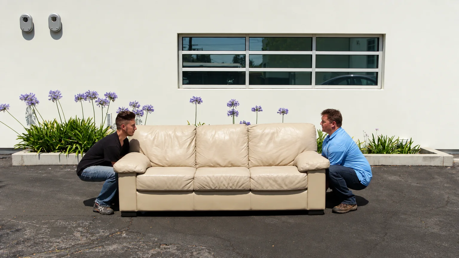 Mover wrapping furniture before transport
